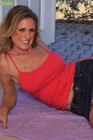 Mature Blonde with Big Tits Toys Her Shaved Pussy to Orgasm