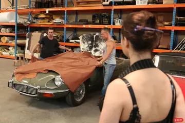 Tattooed German MILF Undresses for Car Threesome