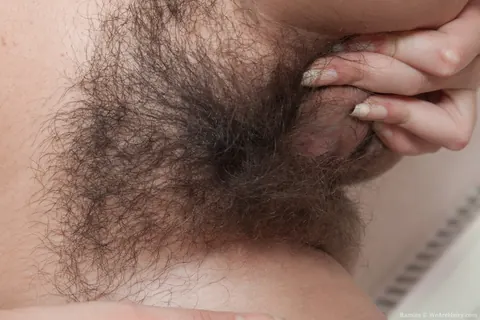 Ramira: Tattooed Brunette Fingers Her Hairy Pussy – photo 10 of 21
