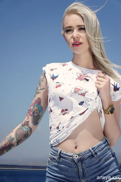 Arteya: Russian Blonde with Natural Tits and a Tattoo Strips Nude Outdoors – photo 15 of 15