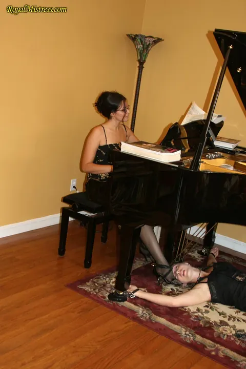 Brunette Dominates Restrained Woman in Stockings and Heels – photo 3 of 12