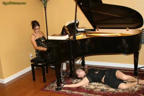 Brunette Dominates Restrained Woman in Stockings and Heels – photo 1 of 12