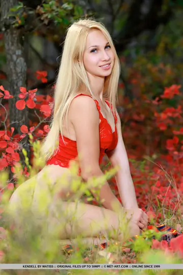 Russian Blonde Spreads Her Shaved Pussy Among Trees
