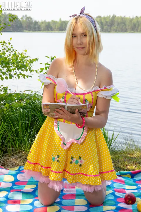 Busty Blonde Strips Out of Her Skirt Outdoors Near Water – photo 2 of 20