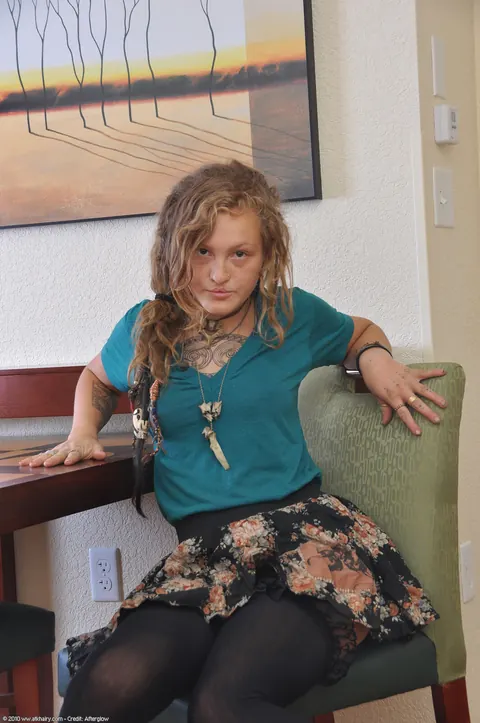 Curly-Haired Woman in Stockings Shows Her Hairy Pussy – photo 1 of 20
