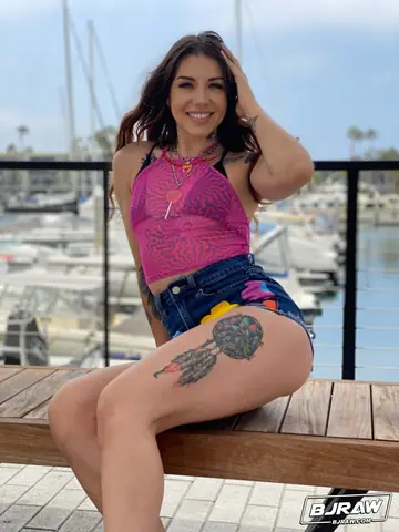 Brunette with Tattoos Gives POV Blowjob in a Bikini and Shorts at Marina