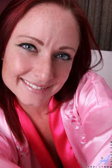 Redhead MILF Fingers Herself and Spreads Her Pussy