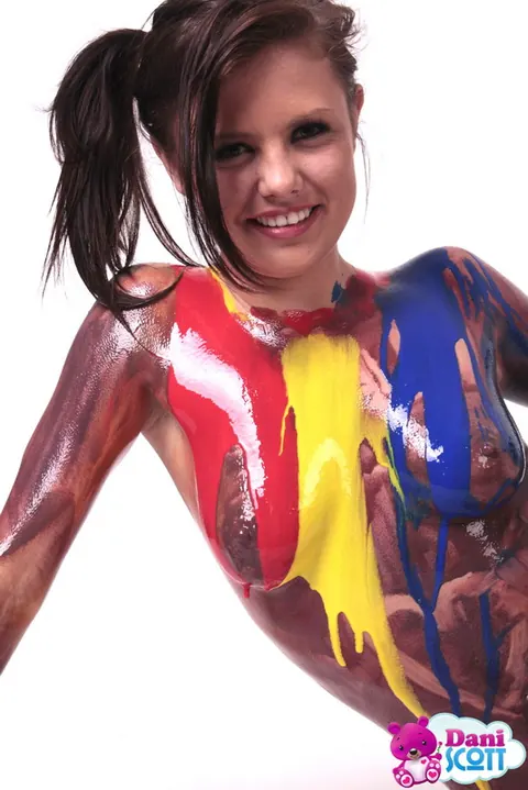 Brunette Coats Her Body in Glossy Paint – photo 12 of 16