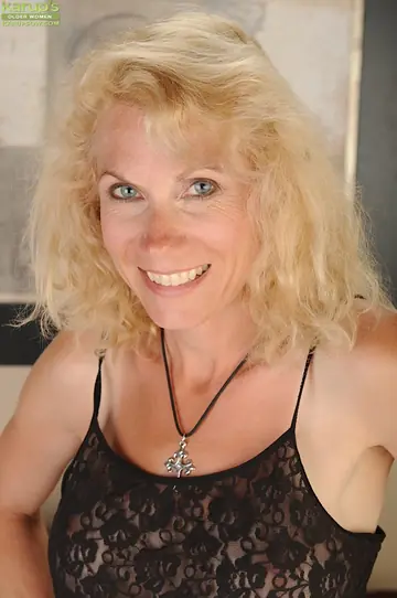 Mature Blonde Gives a Blowjob and Uses a Dildo in Lingerie