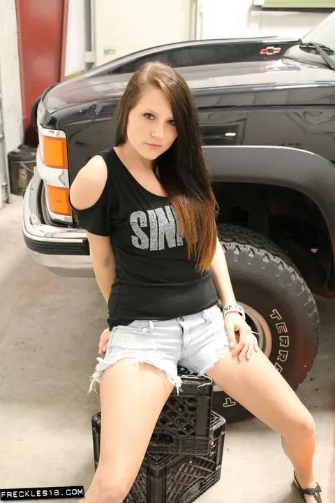 Busty Brunette Spreads in Shorts and Panties in the Garage – photo 2 of 12