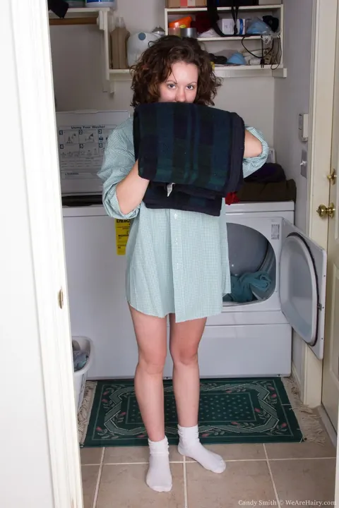 Candy Smith: Petite Curly Brunette Strips and Spreads in Laundry Room – photo 4 of 17