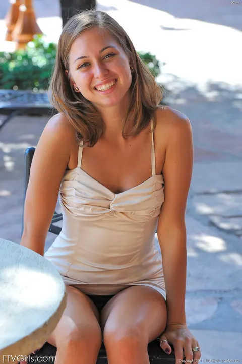 Riley Reid: Brunette Walks Outdoors in High Heels and a Skirt – photo 3 of 16
