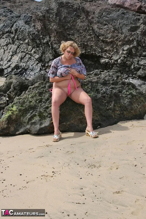Curvy Claire: Curvy Mature Redhead Exposes Her Big Tits on the Beach – photo 14 of 20