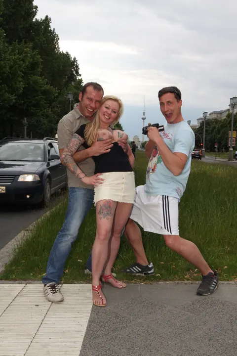 ELYSA SKY: Busty Blonde in a Skirt Takes Two Men Outdoors – photo 20 of 20