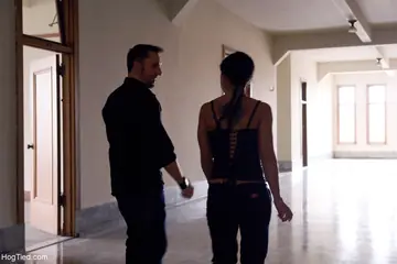 Brunette with Small Natural Tits and Tattoo Spreads in Bondage