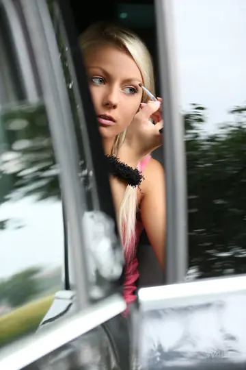 Blonde Strips Out of Her Heels in the Forest