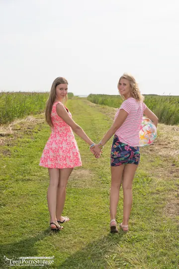Two Blonde Women Strip Off Bikinis for Lesbian Play on the Beach