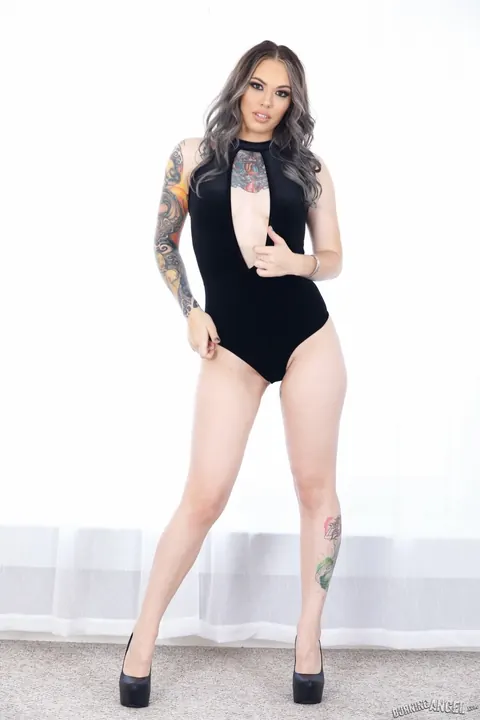 Curly Tattooed Babe Peels Off Her Black Bodysuit – photo 1 of 17