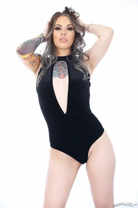 Curly Tattooed Babe Peels Off Her Black Bodysuit – photo 2 of 17