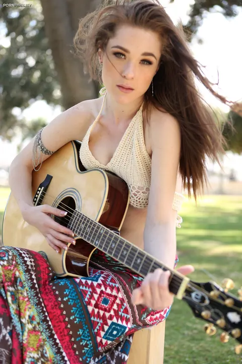 Penny Brooks: Skinny British Redhead Flashes Her Tits Playing Guitar Outdoors – photo 13 of 17