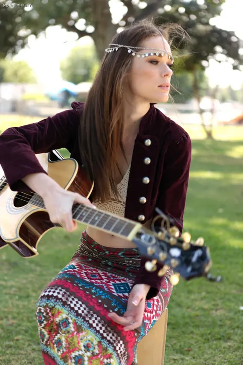 Penny Brooks: Skinny British Redhead Flashes Her Tits Playing Guitar Outdoors – photo 1 of 17
