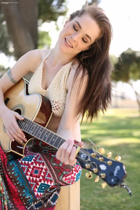 Penny Brooks: Skinny British Redhead Flashes Her Tits Playing Guitar Outdoors – photo 14 of 17