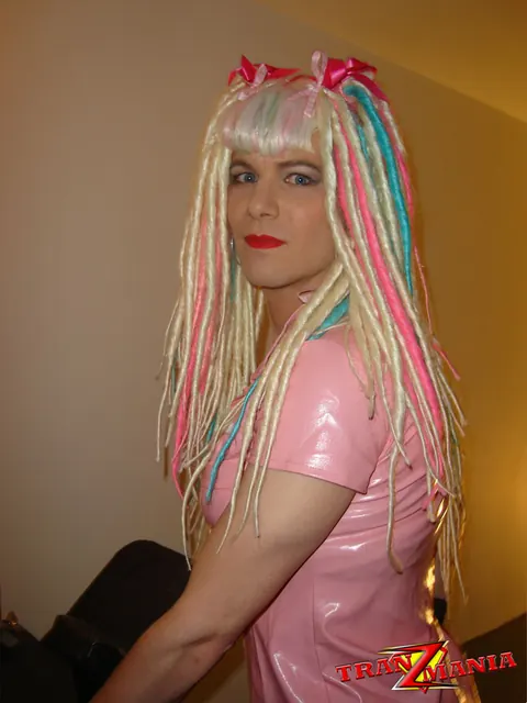 Trans Woman Strips Off Her Top and Poses Front and Back for the Camera – photo 5 of 15