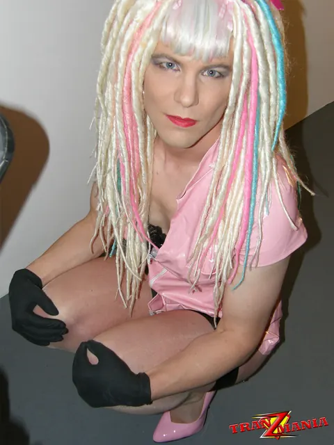 Trans Woman Strips Off Her Top and Poses Front and Back for the Camera – photo 10 of 15