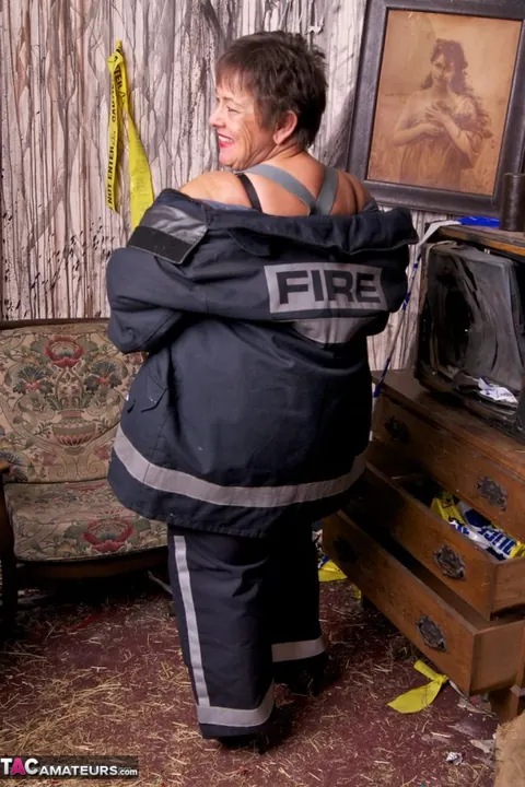 European MILF Strips Out of Her Firefighter Uniform – photo 12 of 20