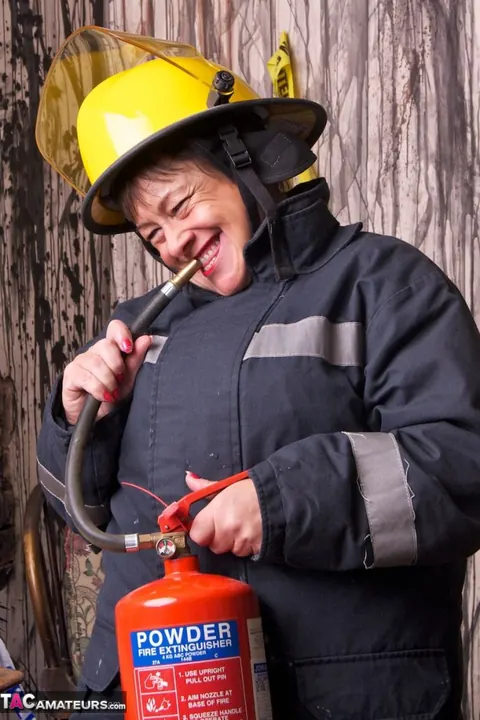 European MILF Strips Out of Her Firefighter Uniform – photo 8 of 20