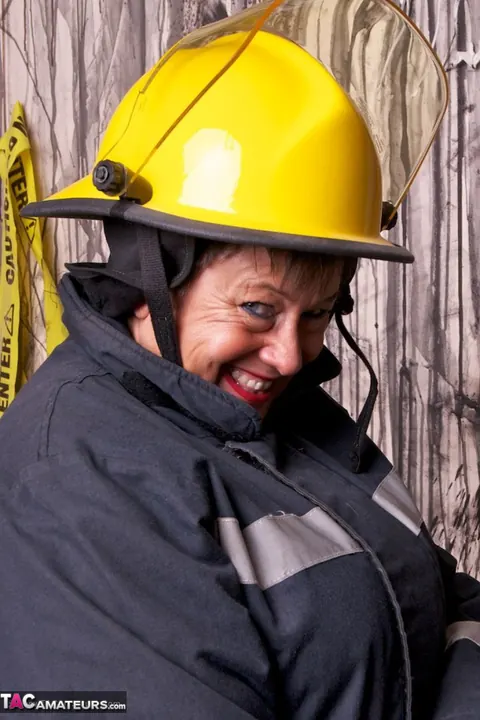 European MILF Strips Out of Her Firefighter Uniform – photo 9 of 20