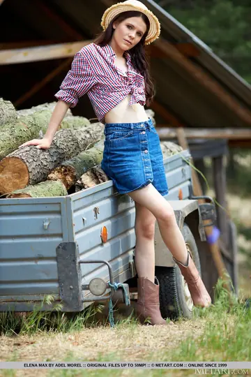 Brunette in Boots Splits Firewood and Spreads in the Forest