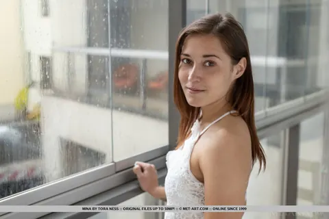 Brunette in a Skirt Spreads Her Shaved Pussy – photo 1 of 18
