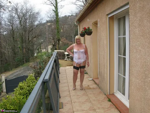 Curvy Mature Blonde Flashes Her Big Tits Outdoors in Lingerie – photo 2 of 16