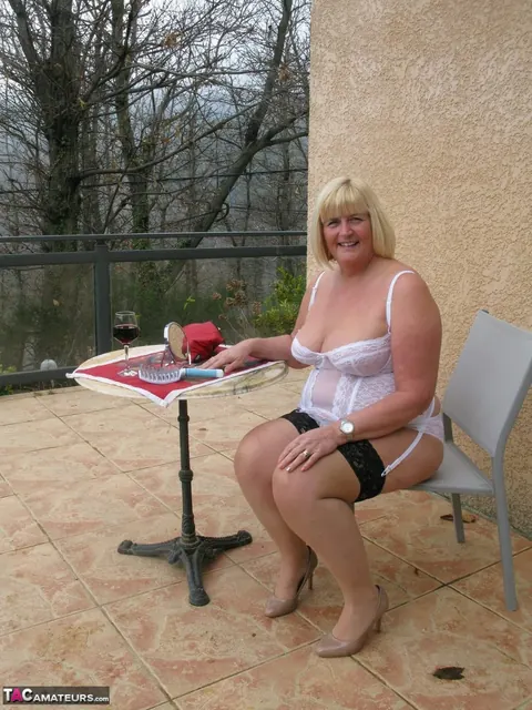 Curvy Mature Blonde Flashes Her Big Tits Outdoors in Lingerie – photo 9 of 16