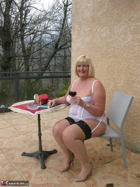 Curvy Mature Blonde Flashes Her Big Tits Outdoors in Lingerie – photo 10 of 16