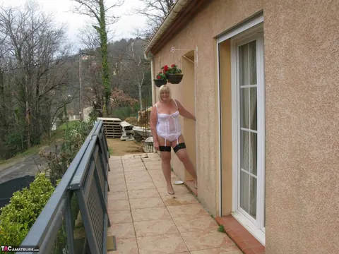 Curvy Mature Blonde Flashes Her Big Tits Outdoors in Lingerie – photo 1 of 16