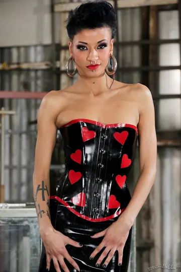 Roggie – Slim Ebony Latina in a Latex Skirt and Heels Flaunts Her Body