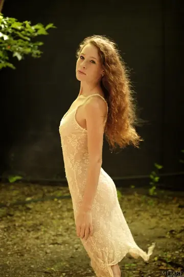 Kia A – Petite Redhead Poses Nude Outdoors