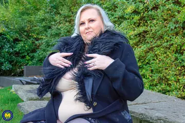 Mature Blonde BBW in Lingerie Masturbates with a Dildo on the Sofa