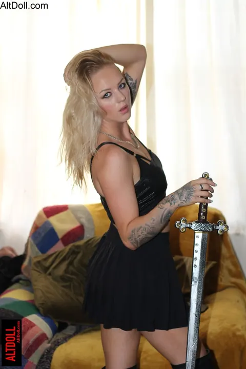 Tattooed Blonde Babe Poses in Cosplay Skirt – photo 15 of 15