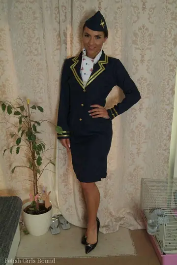 Flight Attendant MILF Strains in Handcuffs and High Heels