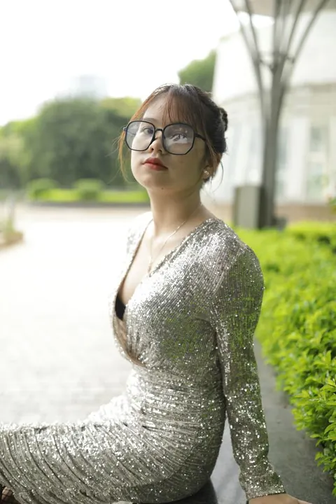 Slim Brunette with Big Tits and Glasses Poses Outdoors – photo 8 of 21