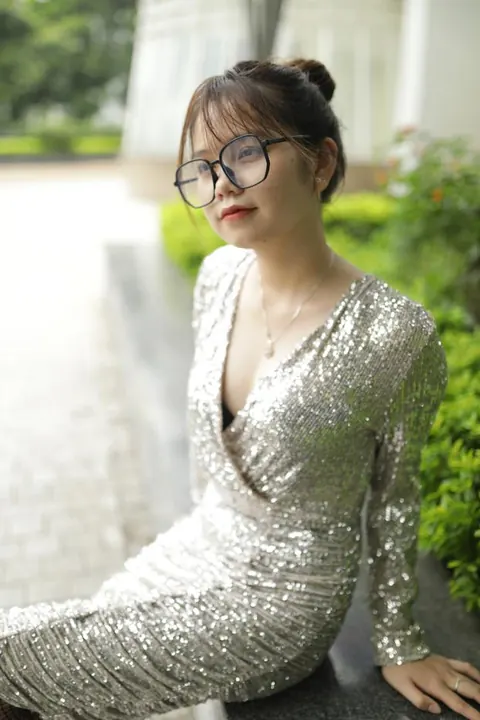 Slim Brunette with Big Tits and Glasses Poses Outdoors – photo 4 of 21