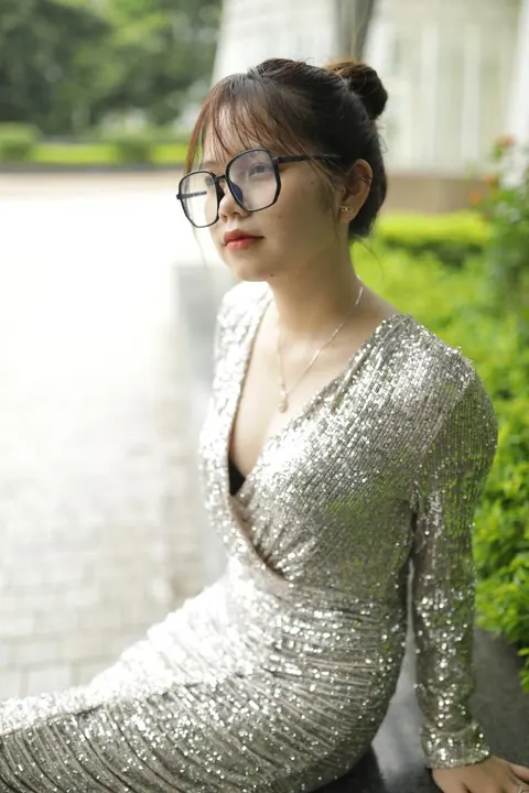 Slim Brunette with Big Tits and Glasses Poses Outdoors – photo 3 of 21