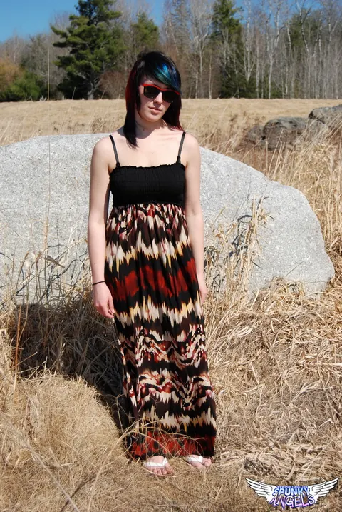 Amateur in Glasses Reveals Her Natural Tits by a Boulder in the Forest – photo 2 of 12