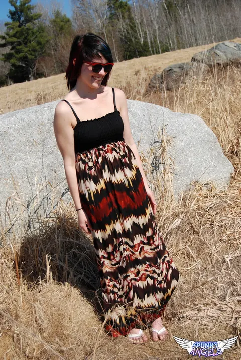 Amateur in Glasses Reveals Her Natural Tits by a Boulder in the Forest – photo 4 of 12