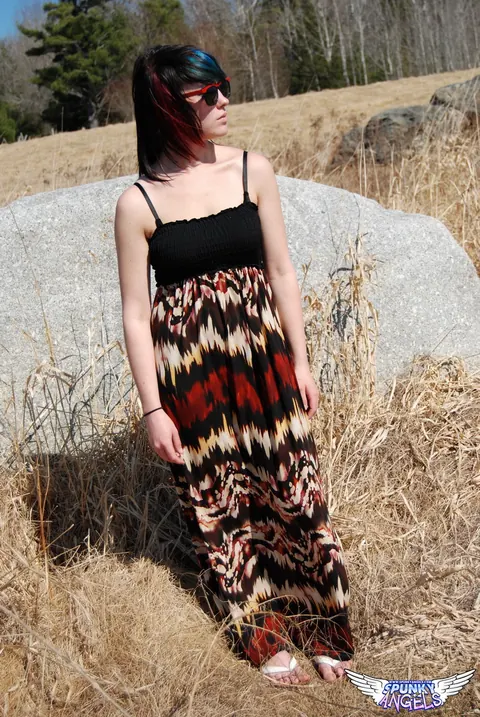 Amateur in Glasses Reveals Her Natural Tits by a Boulder in the Forest – photo 3 of 12