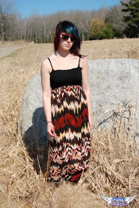 Amateur in Glasses Reveals Her Natural Tits by a Boulder in the Forest – photo 1 of 12