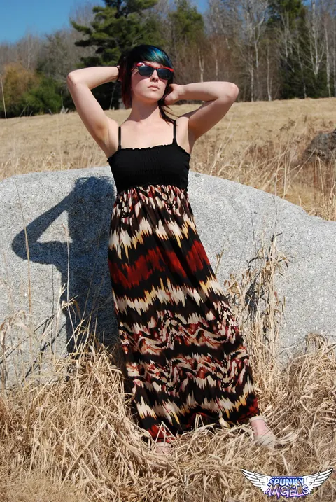 Amateur in Glasses Reveals Her Natural Tits by a Boulder in the Forest – photo 6 of 12
